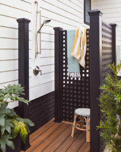 Trex Lattice panles used as privacy screening for an outdoor shower - HGTV 2022 home